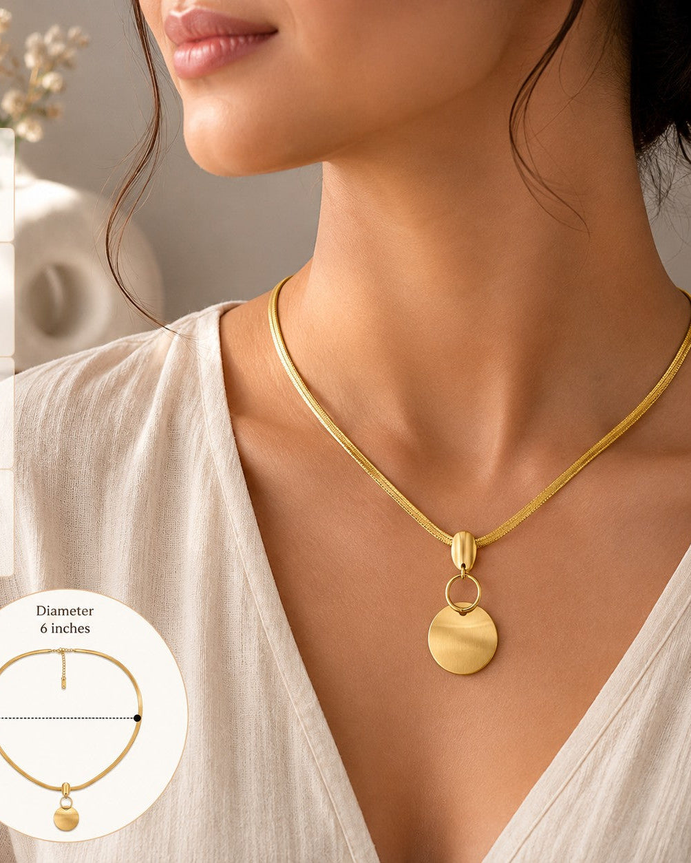 Infographic showing the necklace's snake chain, extender and round pendant details