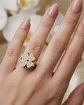Gold crystal flower ring lifestyle image - worn on hand