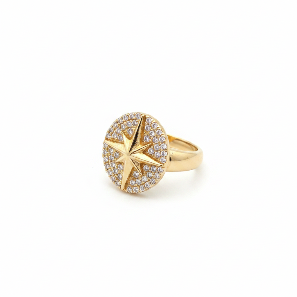 Gold north star pavé diamond disc ring on white background