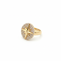 Gold north star pavé diamond disc ring on white background