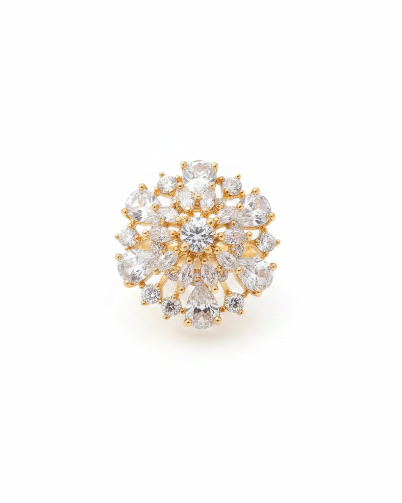 Gold American diamond sunburst cluster cocktail ring on white background