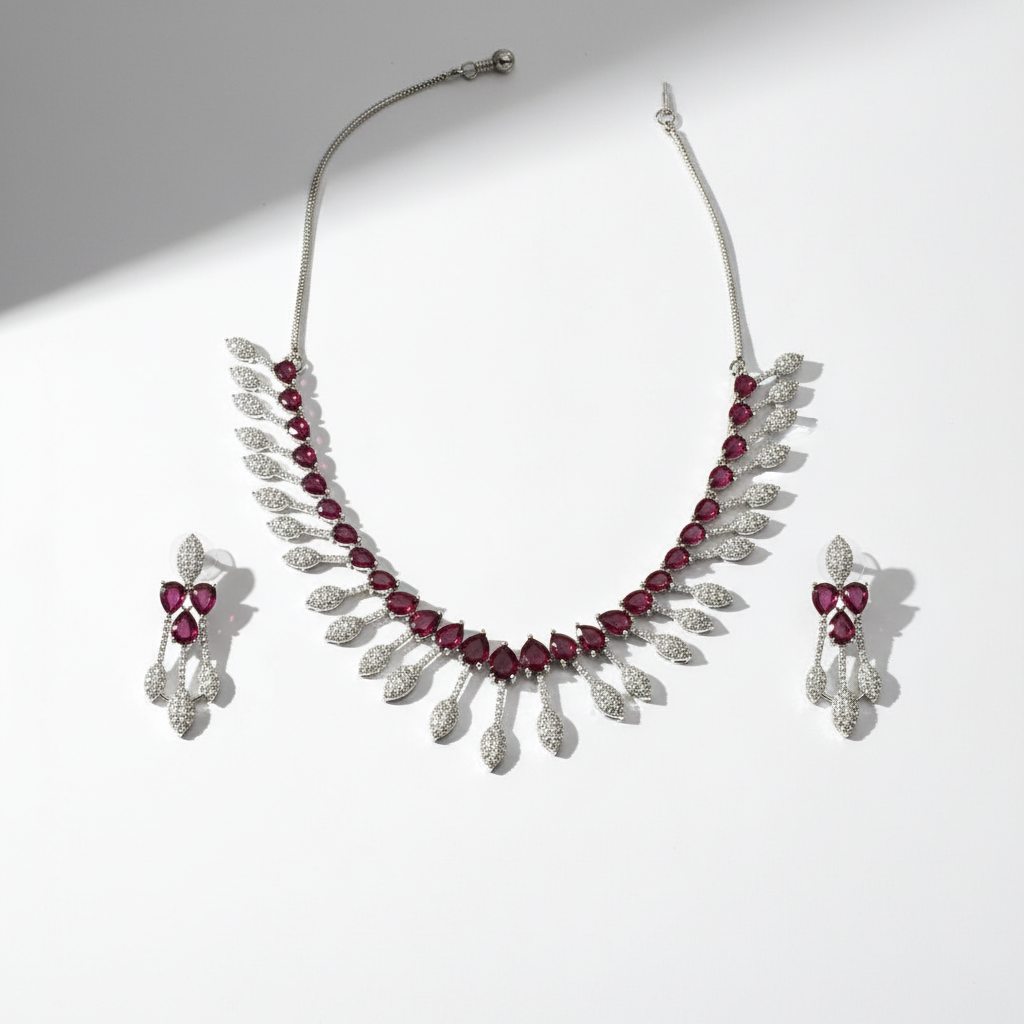 Ruby and American diamond necklace set with matching earrings on white background