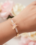 Rose gold butterfly bangle bracelet lifestyle shot