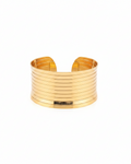 Gold multi-row stacked wide cuff bangle on white background